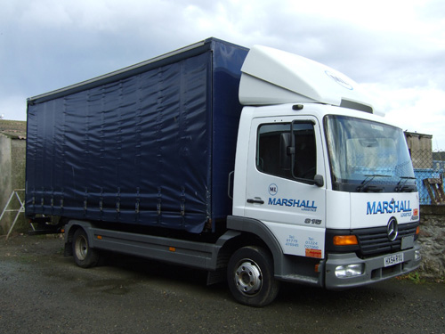 Side view of curtain side lorry